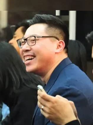 Ian Teh, founder of Prosperum Digital, laughing at an industry event